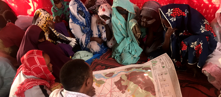 the Mbororo women discuss the map legend