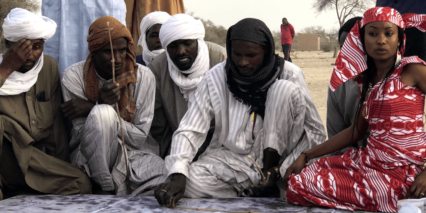 Hindou Oumarou Ibrahim sitting with some other community chiefs