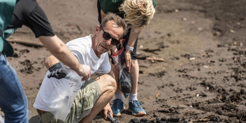 taking water samples from the Dnipro River