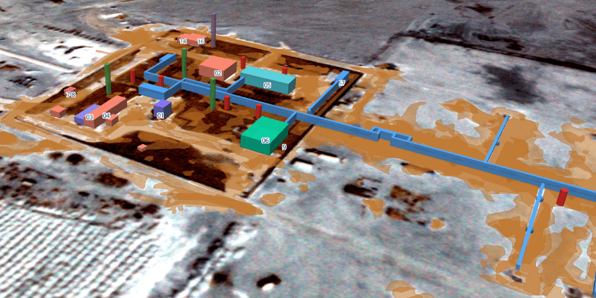 early-stage PAD site with basic structures and pipeline corridor