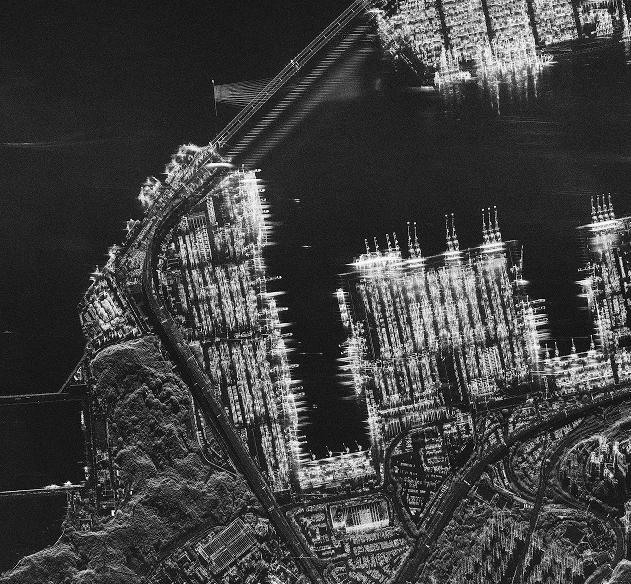 Night-time SAR imaging isolates ship signatures and port layouts regardless of sea state or light conditions. Image: UMBRA.