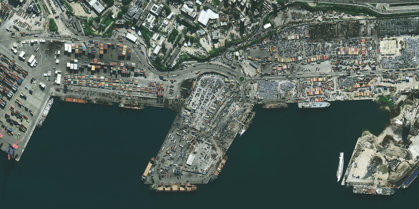 how does satellite tasking work: high-res view of the Port of Beirut showing shipping containers, docks, and moored cargo vessels